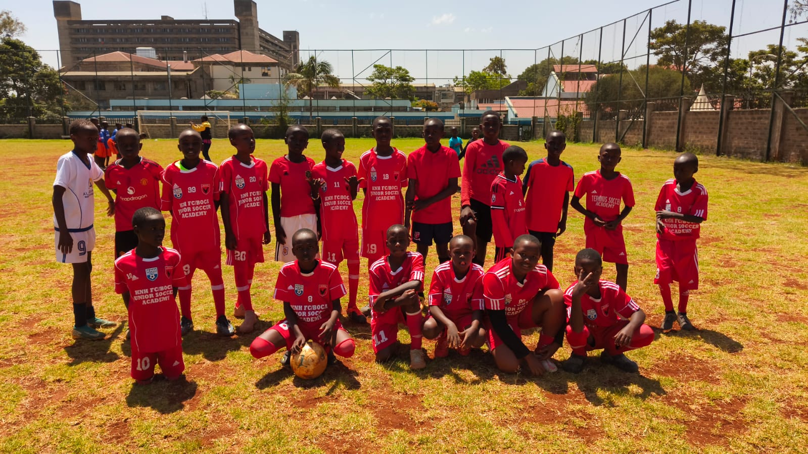 Academy squad portrait in red kit